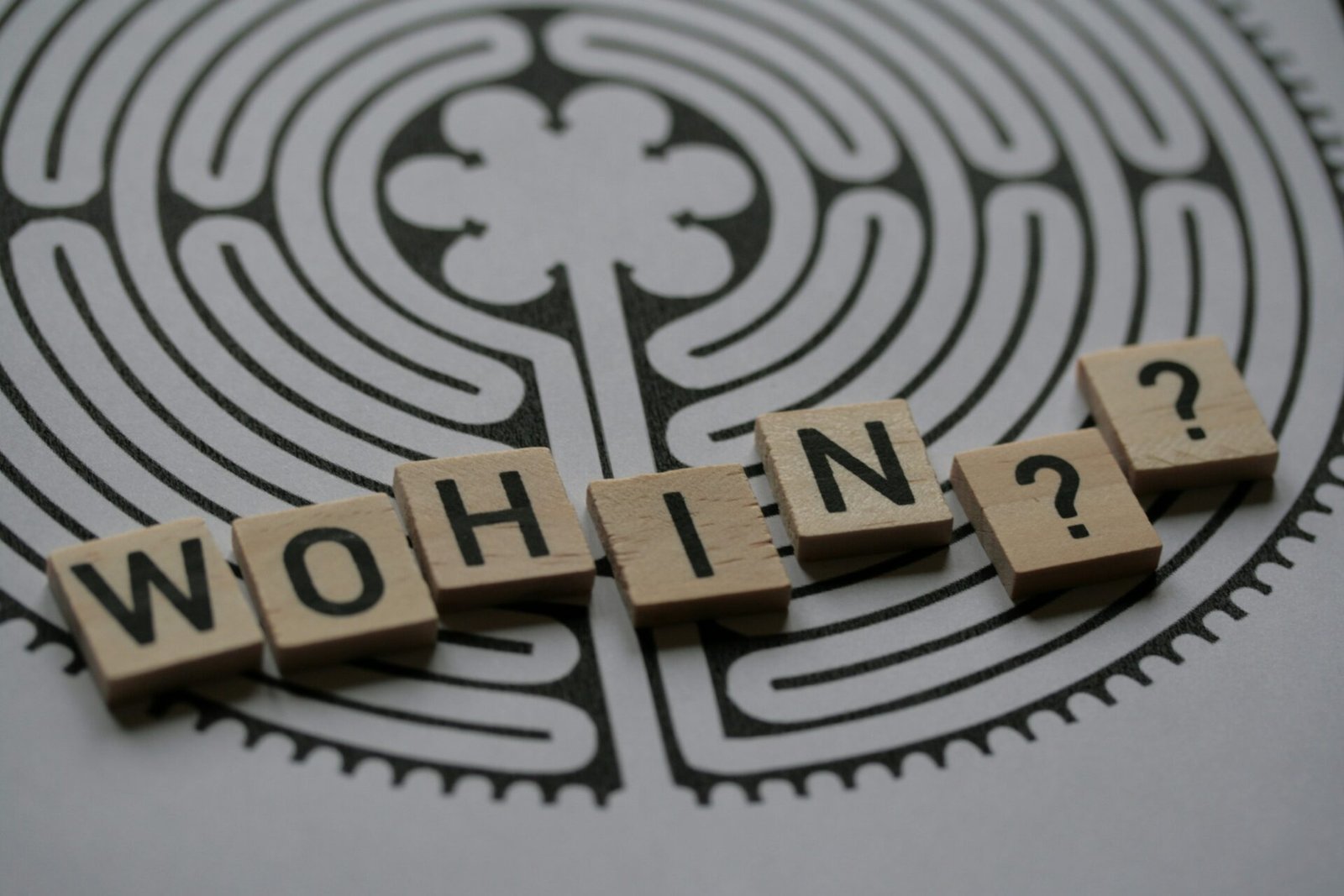 a close up of a close up of scrabble tiles with words saying who's in?
